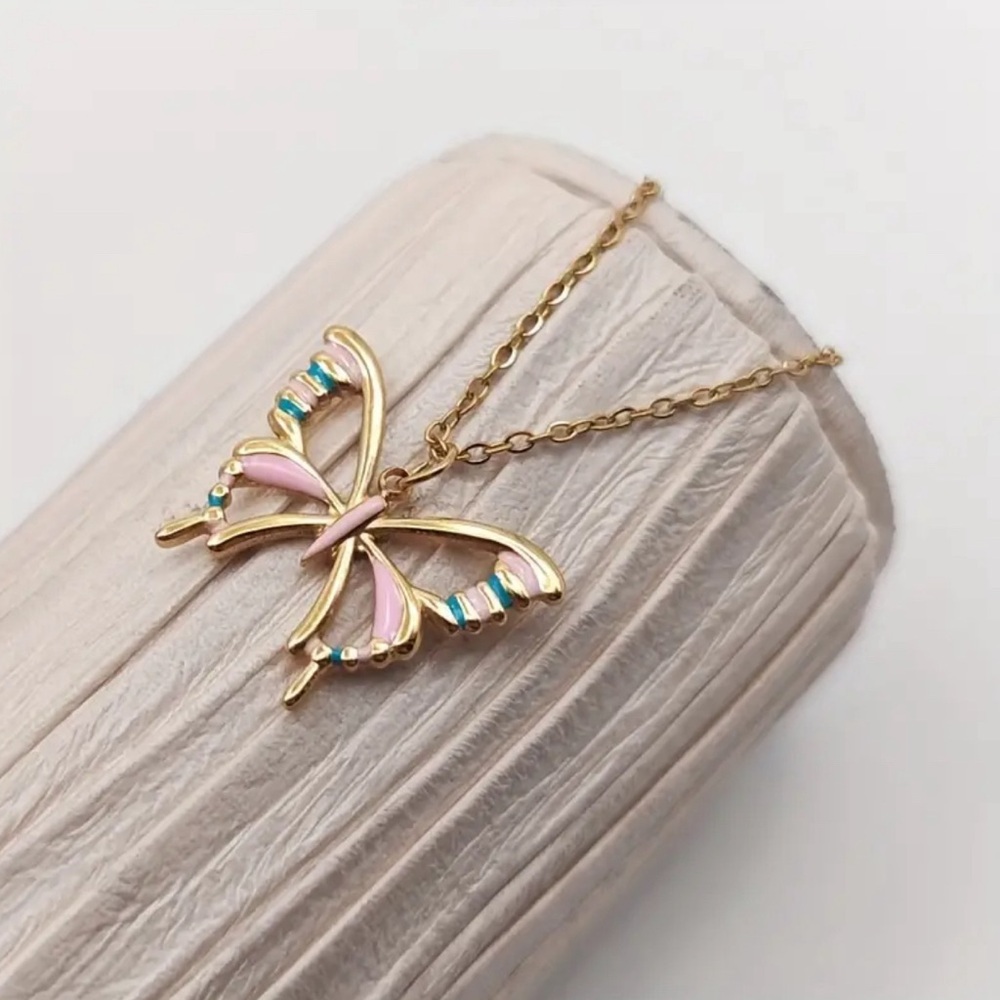 18k Gold Plated Butterfly Pendant Necklace with Pink and Teal CZ Accents.